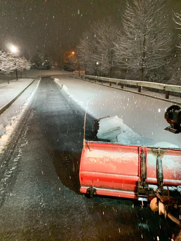 Driveway being plowed after snowfall
